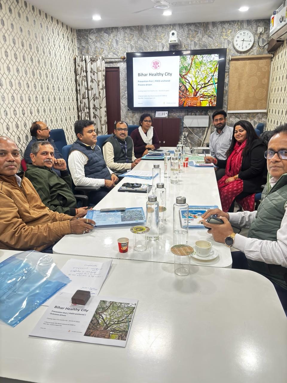 GEMBA team presenting a proposed community health initiative during a technical meeting in Bihar.